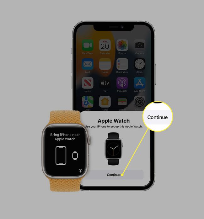 Continue on iPhone with pairing prompt next to an Apple Watch