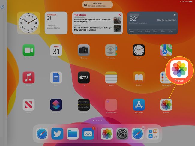 iPad screen showing the Photos app icon